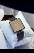 KWC Square Dial — pink/rose dial with gold case aur brown leather strap. 🕐✨